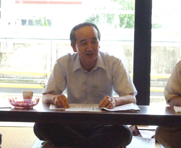 報告する渡辺正好さん